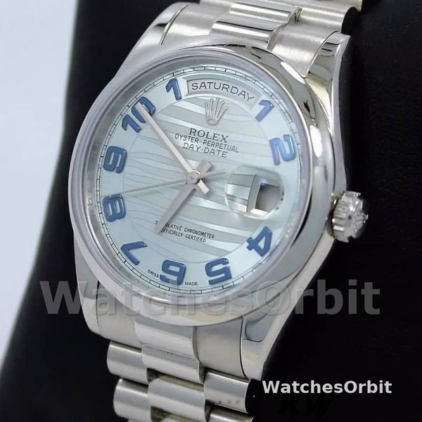Rolex Day Date 118206 Wave Pattern Ice Blue Dial Arabic Numerals 36mm Unisex Replica Watch