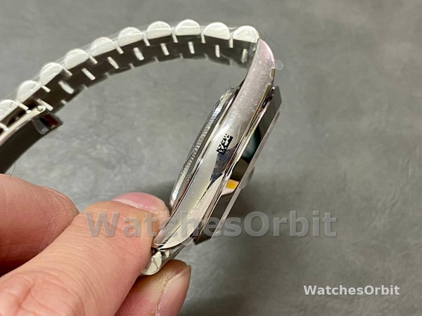 Rolex Day-Date 40mm Arabic Platinum Olive Dial 228206
