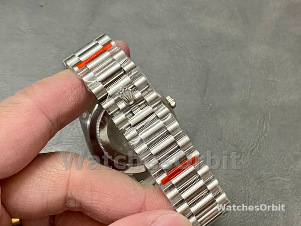 Rolex Day-Date 40mm Arabic Platinum Olive Dial 228206